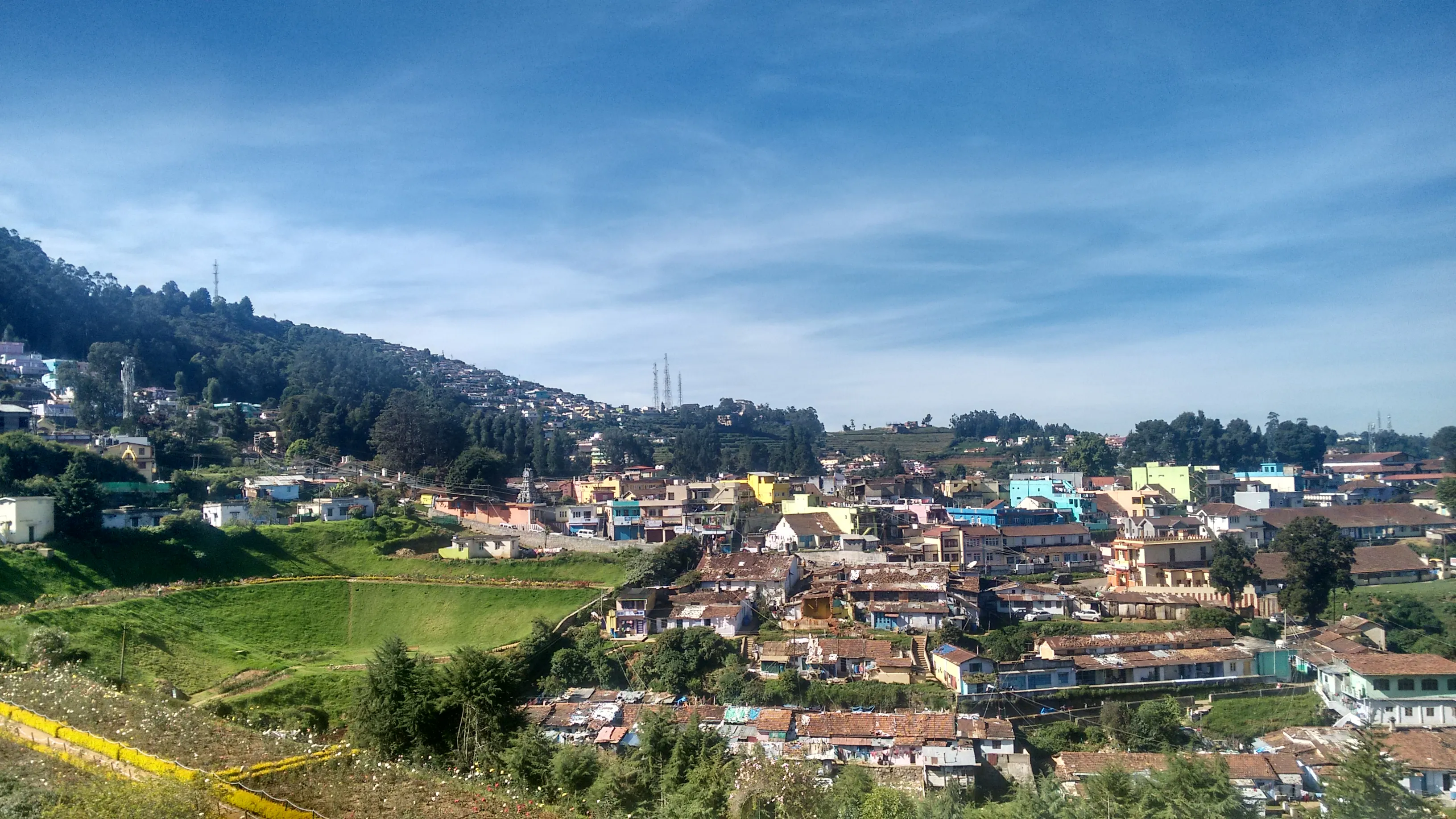 Morning mist over the tea gardens and hills of Ooty